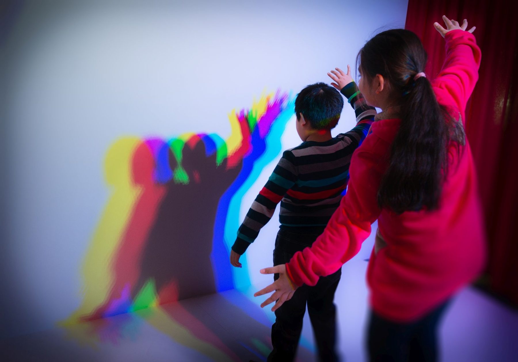 You can create your own coloured shadow in the exhibition "Listen who’s watching".